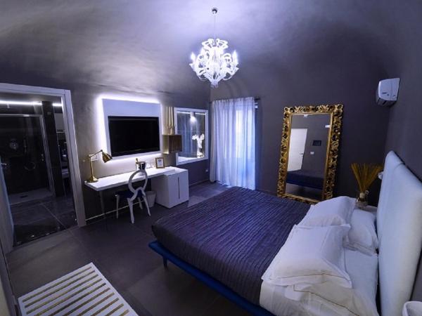 Etna Suite Group : photo 2 de la chambre suite avec baignoire spa