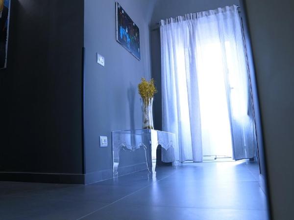 Etna Suite Group : photo 5 de la chambre suite lit king-size avec baignoire spa