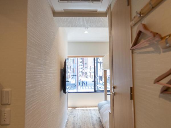 Sakura Cross Hotel Akihabara : photo 7 de la chambre chambre triple avec douche