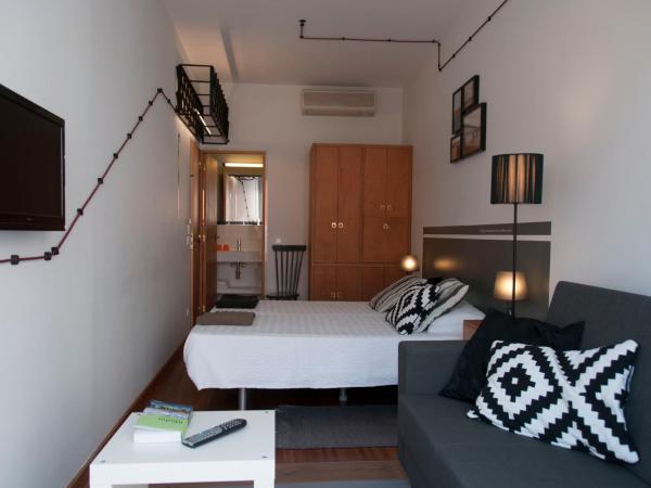 Pensao O Laranjeira : photo 5 de la chambre chambre lits jumeaux supérieure