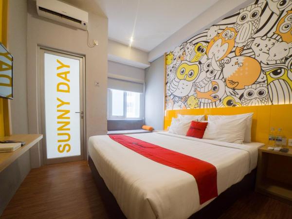 RedDoorz Apartment near Bundaran Satelit Surabaya : photo 1 de la chambre chambre double