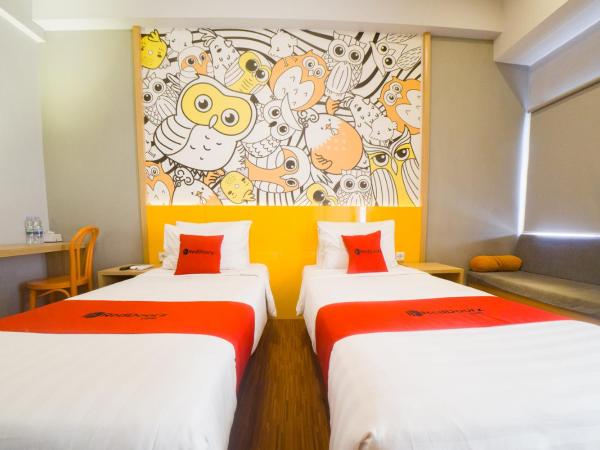 RedDoorz Apartment near Bundaran Satelit Surabaya : photo 4 de la chambre chambre lits jumeaux