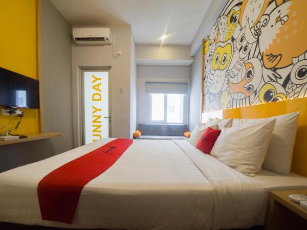 RedDoorz Apartment near Bundaran Satelit Surabaya : photo 4 de la chambre chambre double
