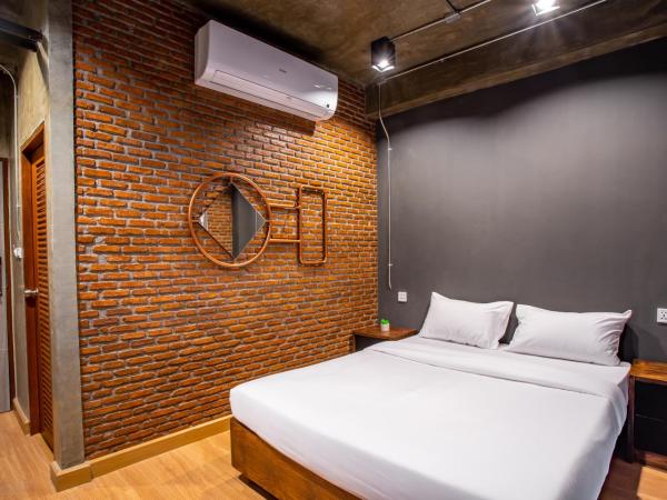 Kaen Hostel : photo 1 de la chambre chambre queen de luxe avec salle de bains privative