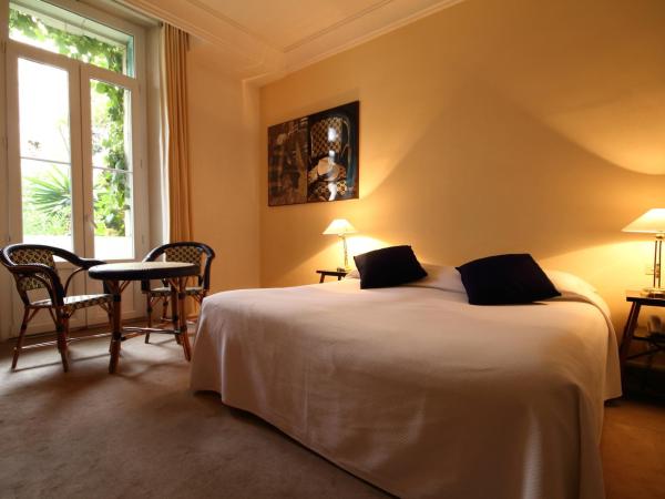 Le Windsor, Jungle Art Hotel : photo 2 de la chambre chambre double premium avec baignoire spa - côté jardin