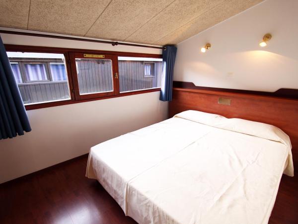 Residence Castell'Verde : photo 1 de la chambre appartement (2 adultes + 3 enfants) (s)