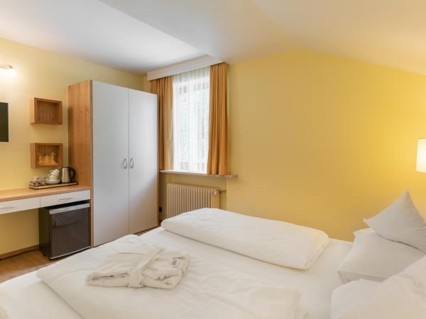 Hotel Garni Haus Arenberg : photo 9 de la chambre chambre triple