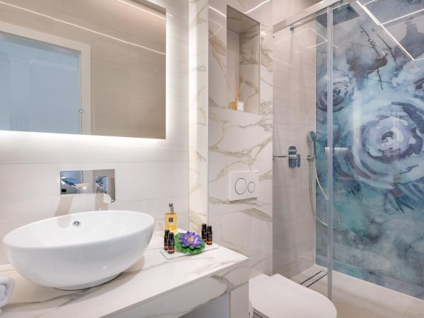 Flos Luxury Rooms : photo 4 de la chambre petite chambre double