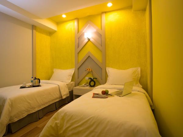 Sunshine Inn Plus : photo 3 de la chambre chambre lits jumeaux standard