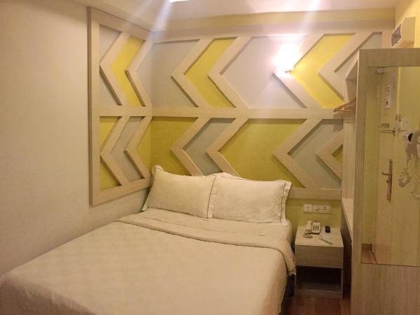 Sunshine Inn Plus : photo 2 de la chambre chambre standard lit queen-size