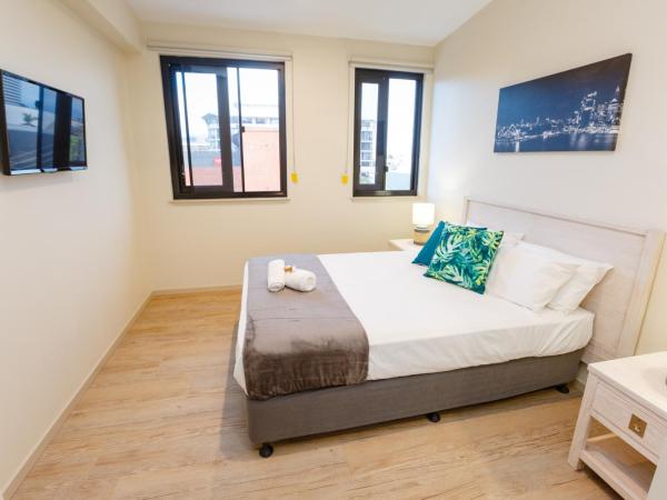 Global Backpackers Cairns : photo 3 de la chambre chambre lit queen-size