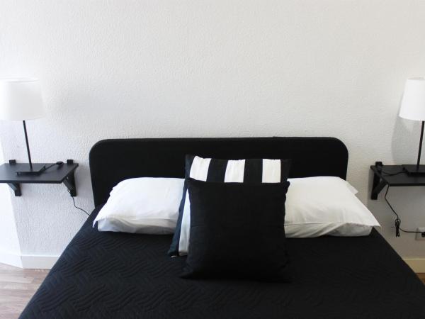 TMJ BeB : photo 2 de la chambre chambre double avec patio