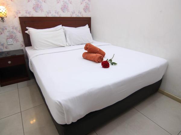 Rose Cottage Hotel Taman Perling : photo 2 de la chambre chambre double deluxe