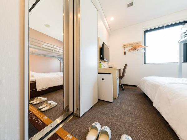 Super Hotel Tokyo Kinshicho Ekimae : photo 1 de la chambre chambre adjacente