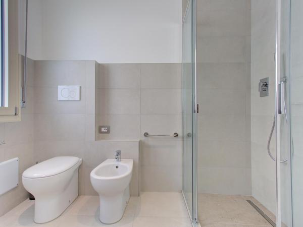 Alloggio Nella : photo 6 de la chambre chambre triple - vue sur jardin