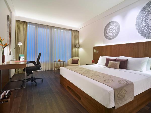 Vivanta Chennai IT Expressway OMR : photo 1 de la chambre executive room pool view twin bed with 25% off on food & soft beverages