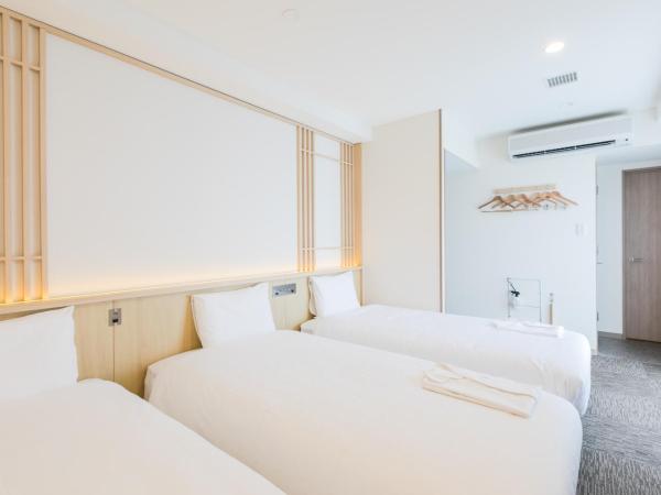 Henn na Hotel Kyoto Hachijoguchi : photo 2 de la chambre chambre triple