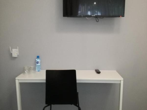 City Rooms Szczecin : photo 4 de la chambre chambre triple classique