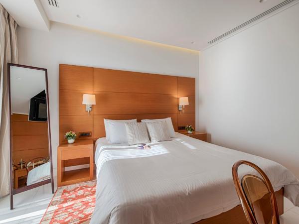 Bellevue On The Beach Suites : photo 2 de la chambre suite 1 chambre