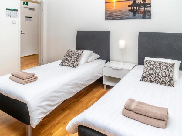 Hotell Linden : photo 1 de la chambre grande chambre familiale