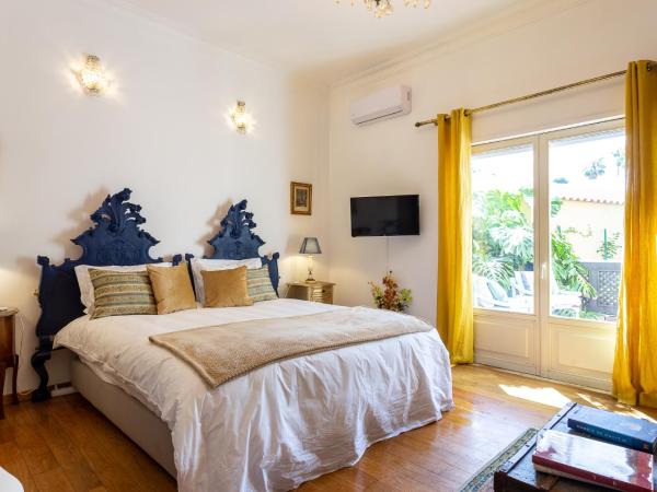 Geronimo Guest House Belém : photo 2 de la chambre suite avec terrasse