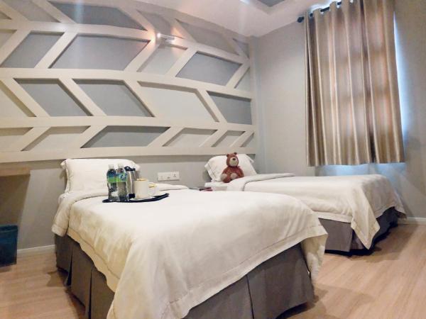 Sunshine Inn : photo 3 de la chambre chambre lits jumeaux deluxe