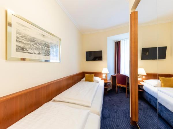 Austria Classic Hotel Wien : photo 4 de la chambre chambre quadruple premium - vue sur cour