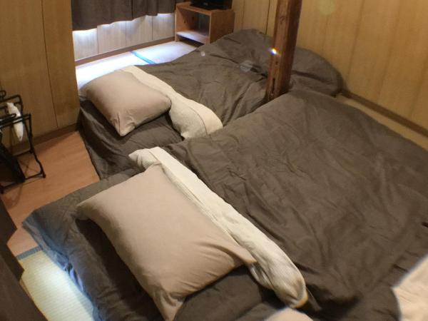 Ryokan Nakadaya : photo 1 de la chambre chambre lits jumeaux