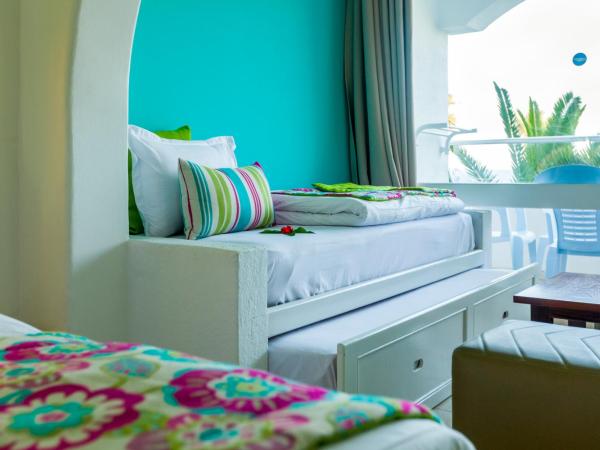 Splash World Venus Beach : photo 2 de la chambre chambre quadruple - vue sur jardin