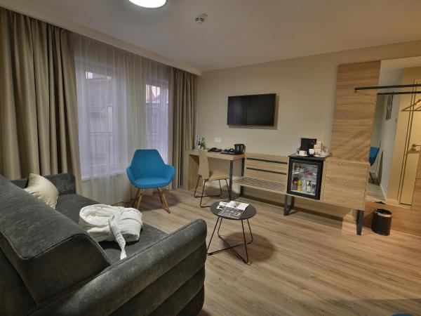 EA Hotel New Town : photo 4 de la chambre suite junior