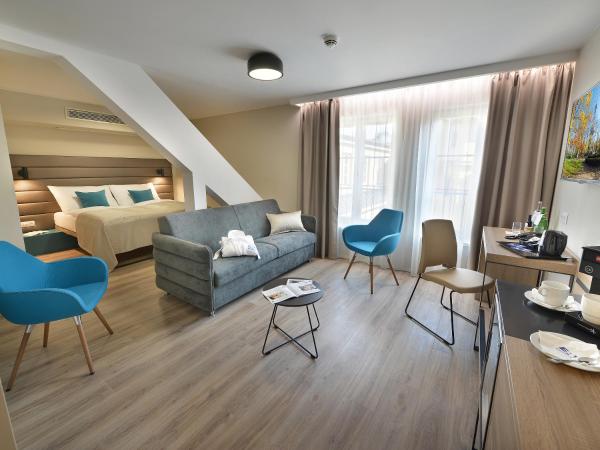 EA Hotel New Town : photo 1 de la chambre suite junior