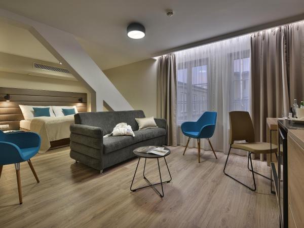 EA Hotel New Town : photo 3 de la chambre suite junior