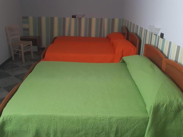 Chiostro Delle Cererie : photo 1 de la chambre chambre quadruple