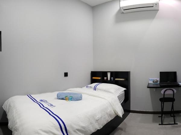 Global Residency : photo 2 de la chambre chambre simple