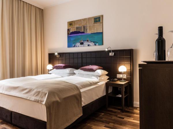 Hotel Sandwirth : photo 3 de la chambre chambre lit queen-size