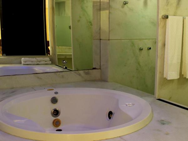 Natal Praia Hotel : photo 2 de la chambre suite avec baignoire spa