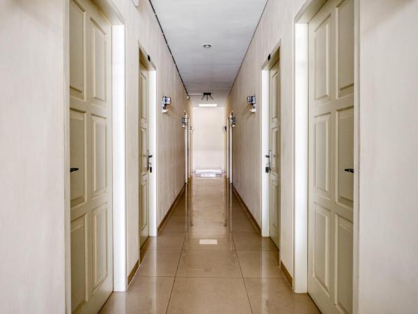 RedDoorz near Ciputra World 3 : photo 1 de la chambre chambre lits jumeaux