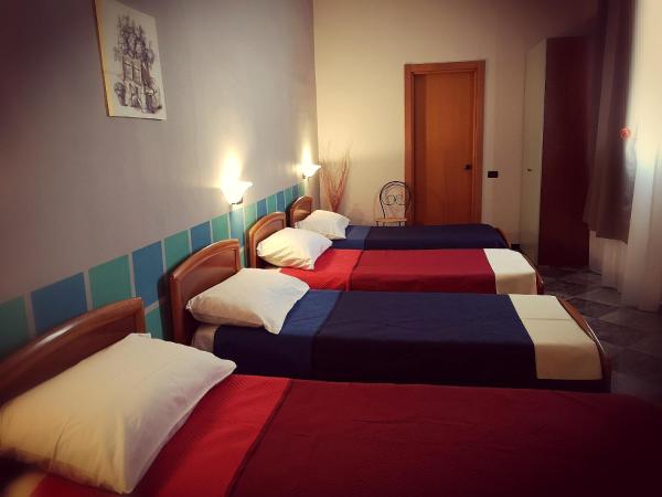 Chiostro Delle Cererie : photo 2 de la chambre chambre quadruple