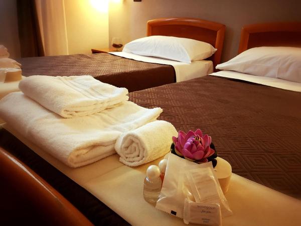 Chiostro Delle Cererie : photo 1 de la chambre chambre triple