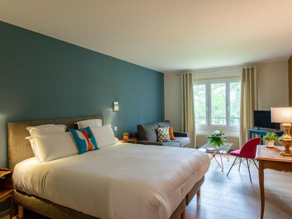 Hôtel Restaurant Gastronomique La Huchette : photo 3 de la chambre suite - vue sur jardin