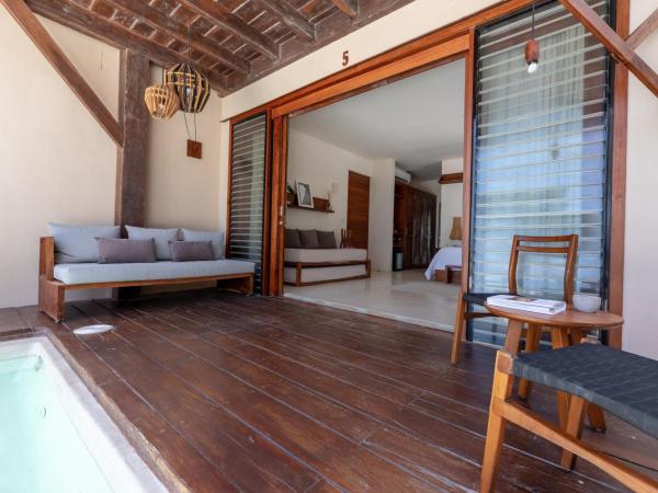La Zebra Boutique Hotel : photo 3 de la chambre suite au rez-de-chaussée avec bassin profond - vue sur mer
