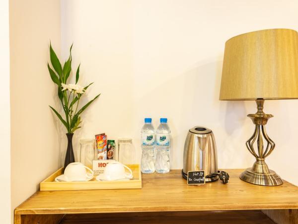 Maneeya Park Residence : photo 10 de la chambre studio lit king-size avec canapé-lit