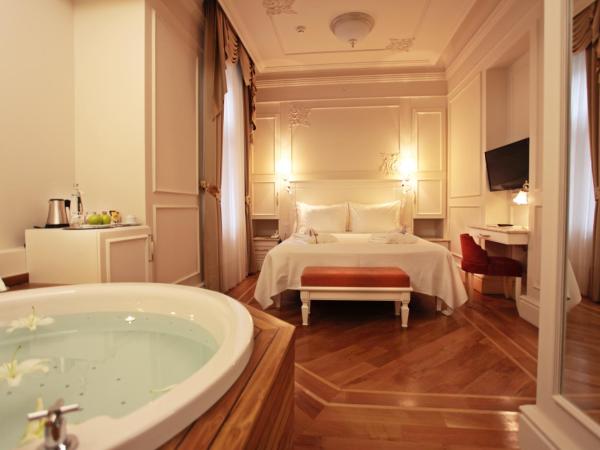 Corinne Art & Boutique Hotel : photo 1 de la chambre chambre classique avec jacuzzi