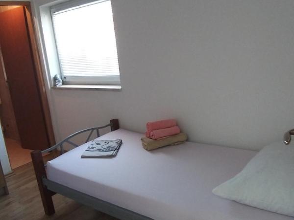 Guesthouse Villa Jurišić : photo 5 de la chambre chambre simple avec salle de bains