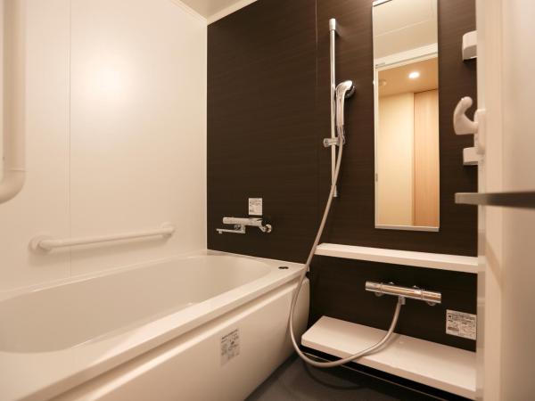 Dormy Inn Premium Namba Natural Hot Spring : photo 4 de la chambre chambre lits jumeaux avec coin tatami - non-fumeurs