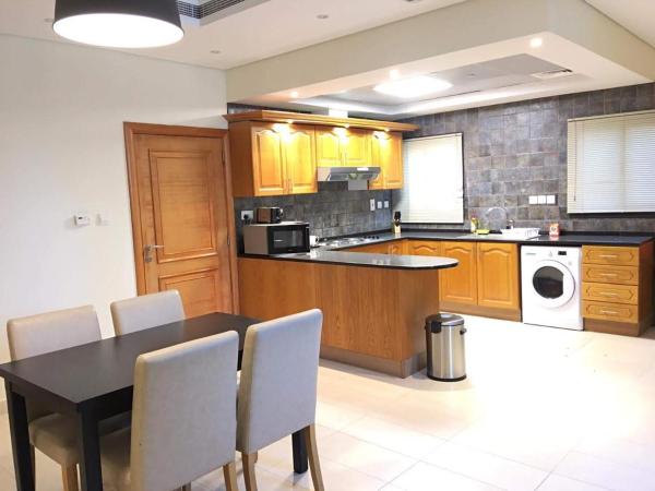 Roda Beach Resort : photo 2 de la chambre sandy shore three bedroom suite