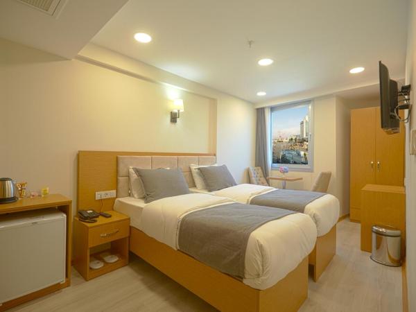 Kartal Palace Taksim Square FAMİLY HOTEL : photo 2 de la chambre chambre familiale standard
