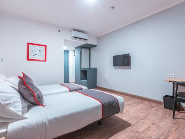 OYO Townhouse 2 Hotel Gunung Sahari : photo 5 de la chambre chambre lits jumeaux deluxe