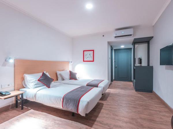 OYO Townhouse 2 Hotel Gunung Sahari : photo 6 de la chambre chambre lits jumeaux deluxe