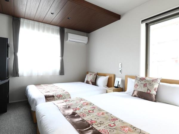 GRAND BASE Hakata City : photo 2 de la chambre chambre lits jumeaux standard